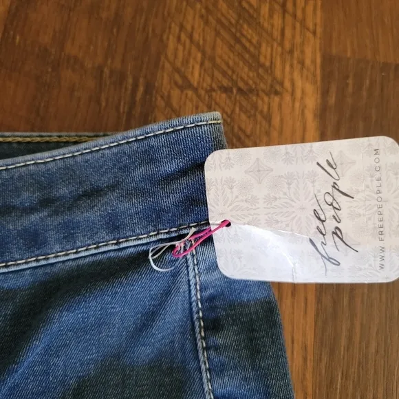 NWT WE THE FREE Just Float On Flare Size 29 Jericho Blue Raw Hem high rise
