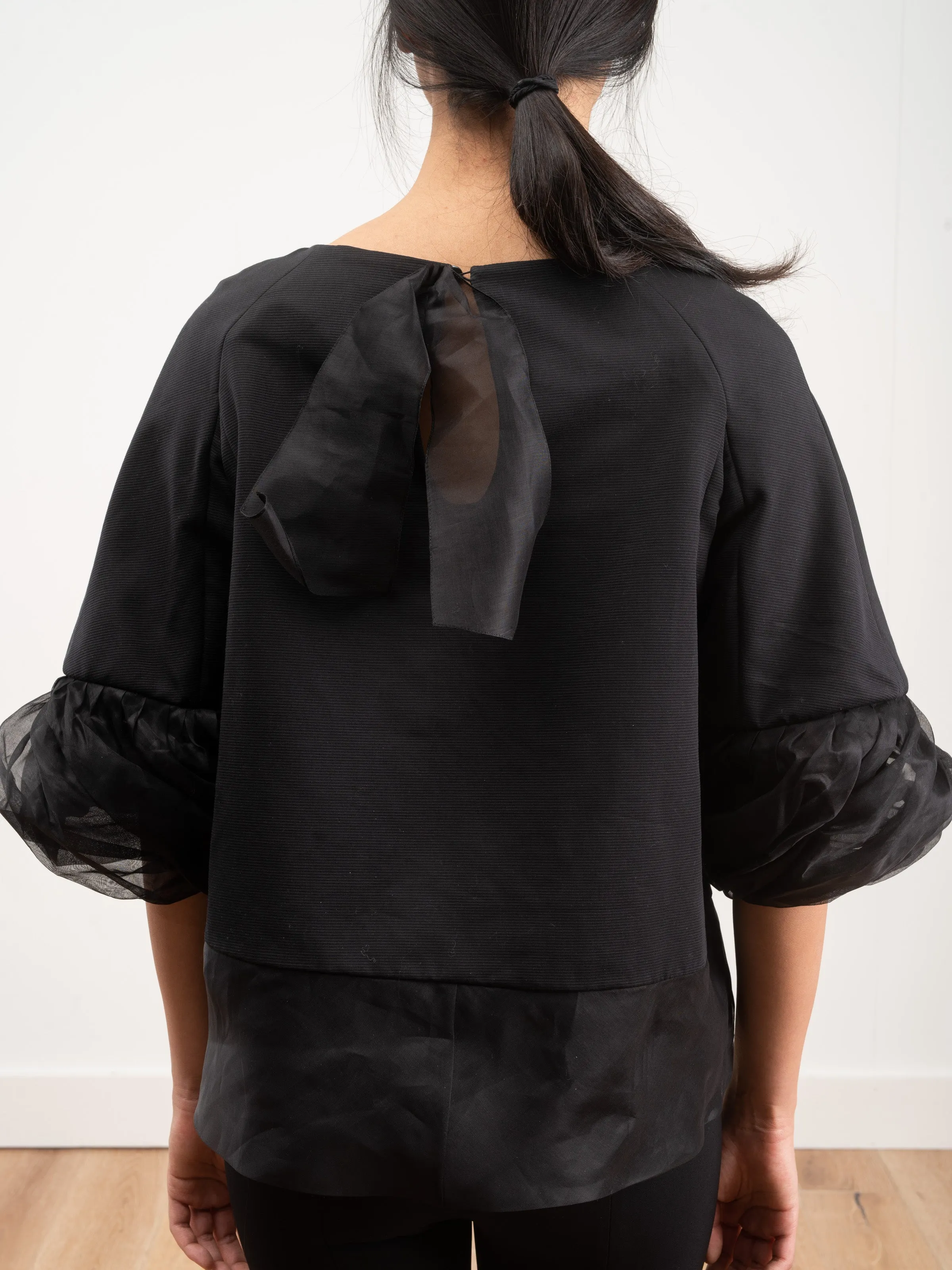 top with ruffle sleeve
